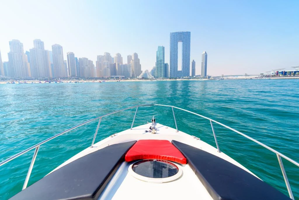 View from the yacht deck across the water toward the skyline